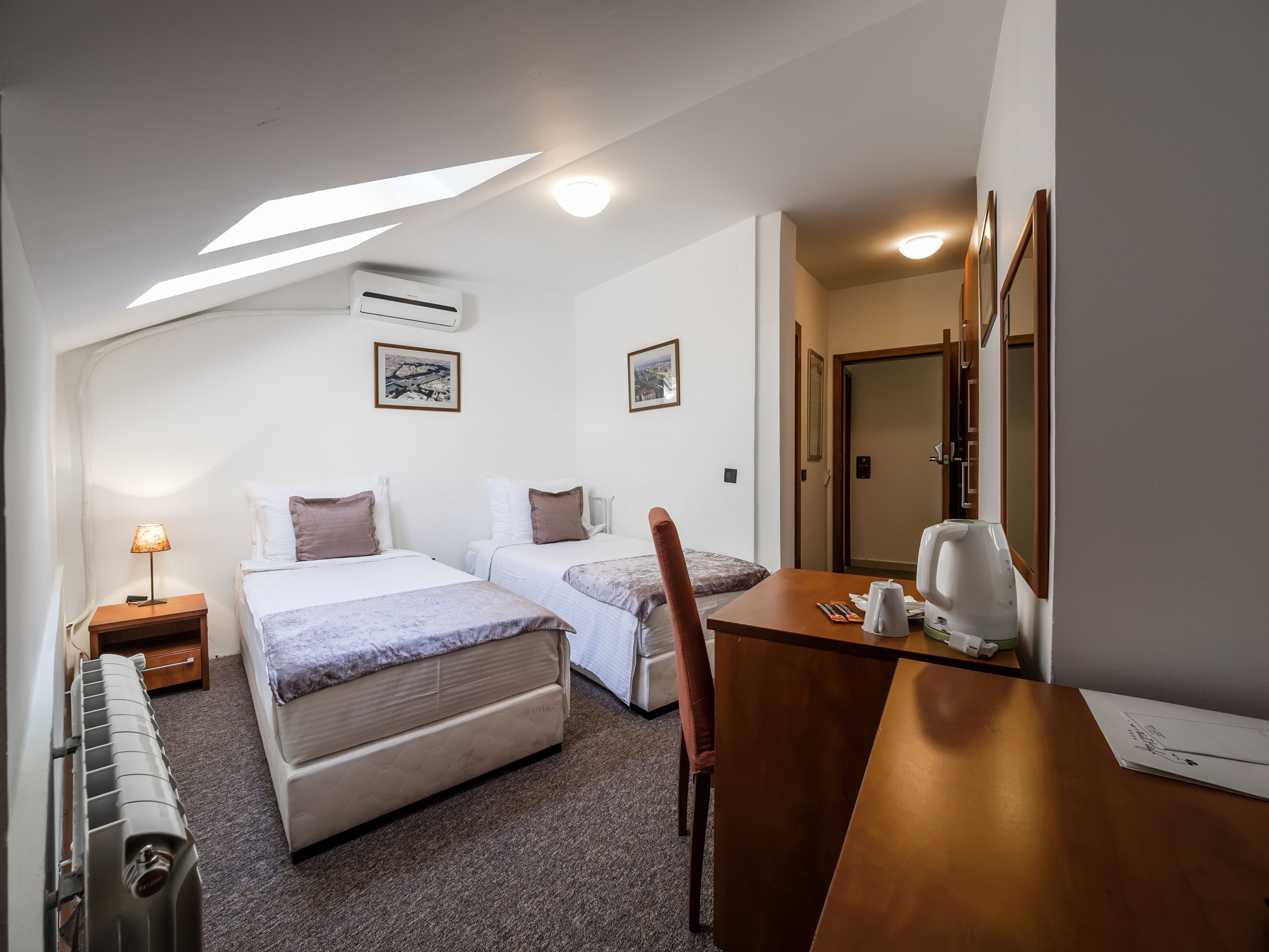 economy room | 1 bedroom, premium bedding, minibar, in-room safe