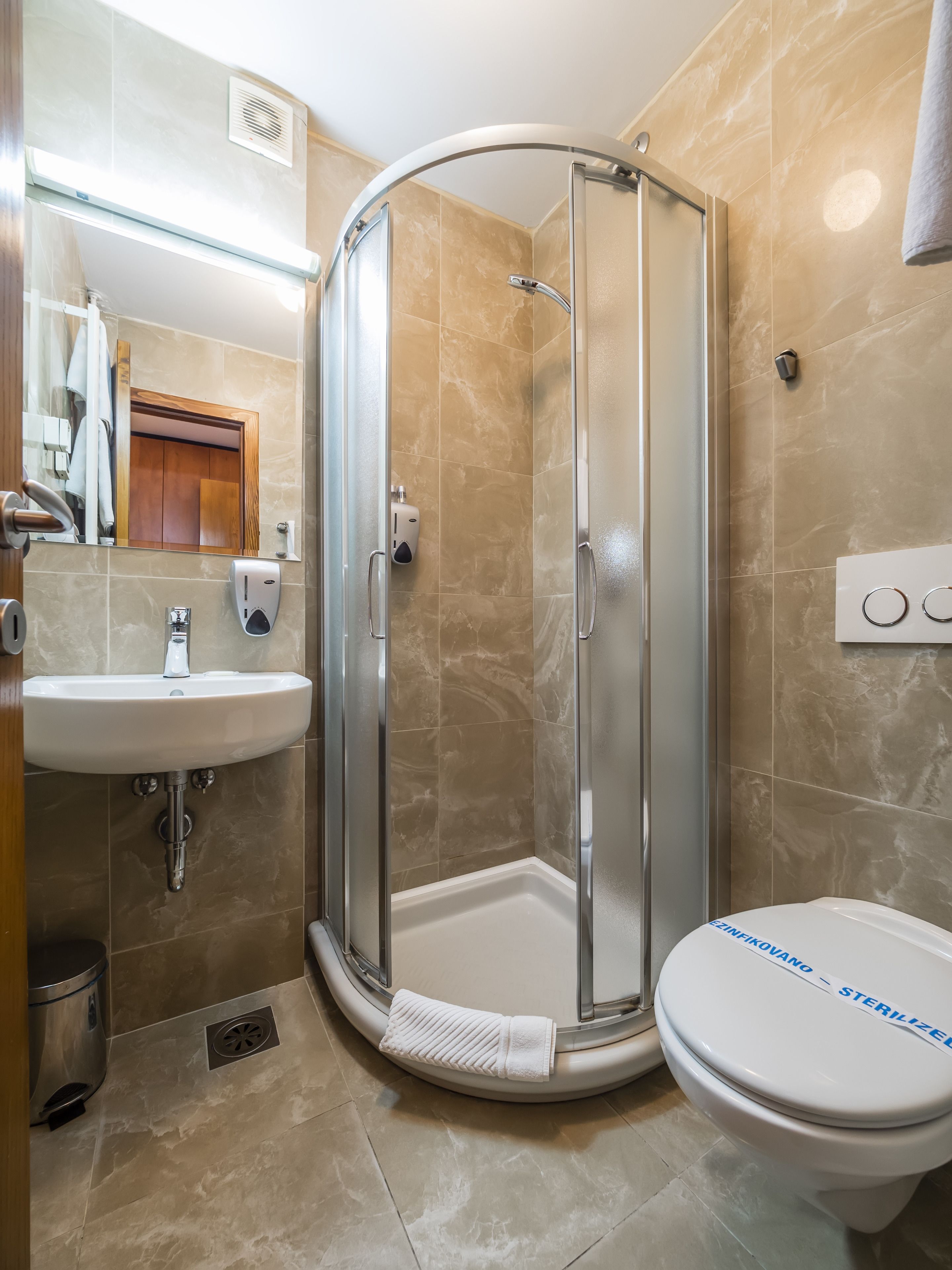 economy room | bathroom | hair dryer, bathrobes, towels