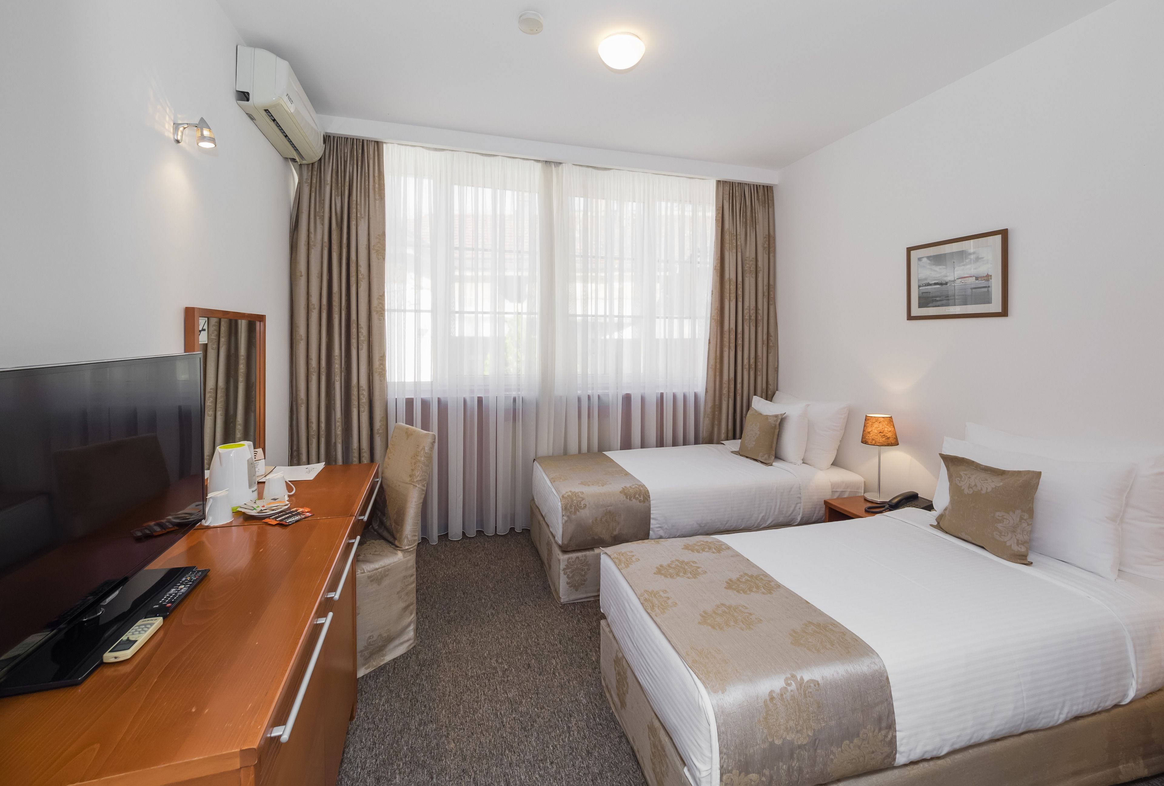 economy room | 1 bedroom, premium bedding, minibar, in-room safe