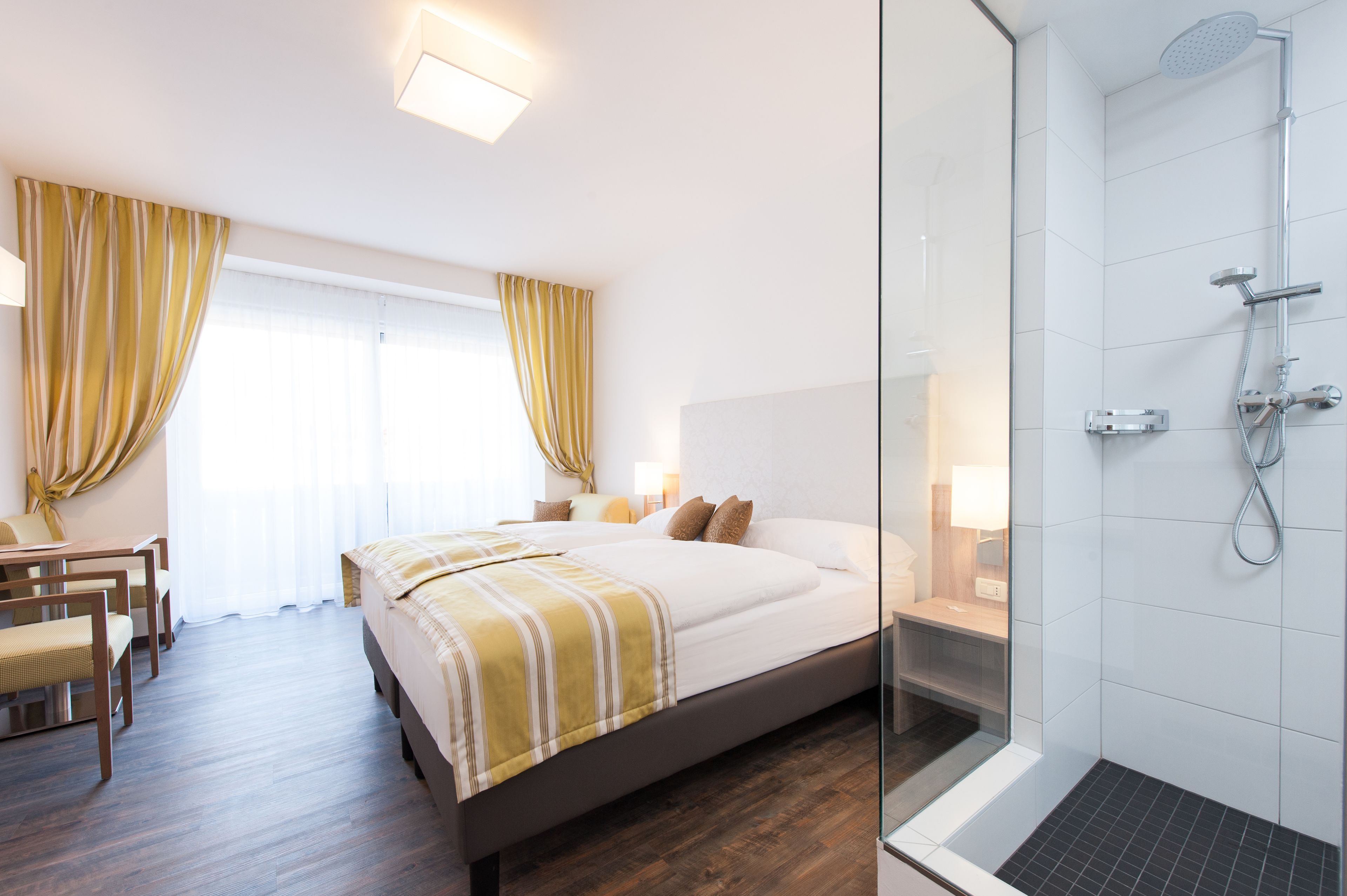 Double Room, Garden Area | Minibar, in-room safe, free WiFi, bed sheets