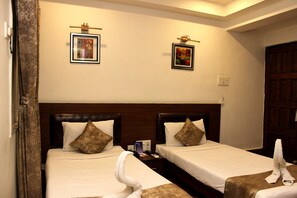 Executive Room | Memory-foam beds, minibar, individually decorated