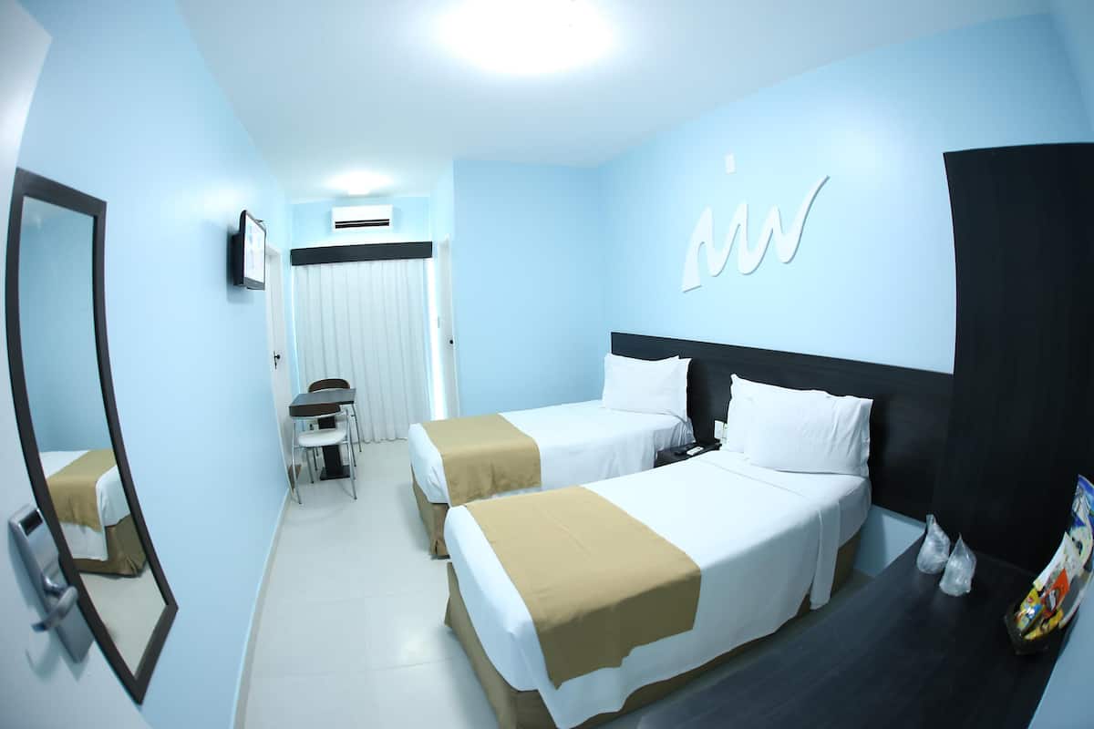 Minibar, in-room safe, blackout drapes, free WiFi