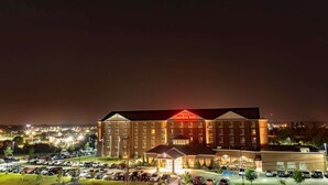 A large, multi-story hotel with a prominent 'Hilton Garden Inn' sign. The building features a symmetrical facade with evenly spaced windows and a central entrance. - Hilton Garden Inn Bangor (Bangor)