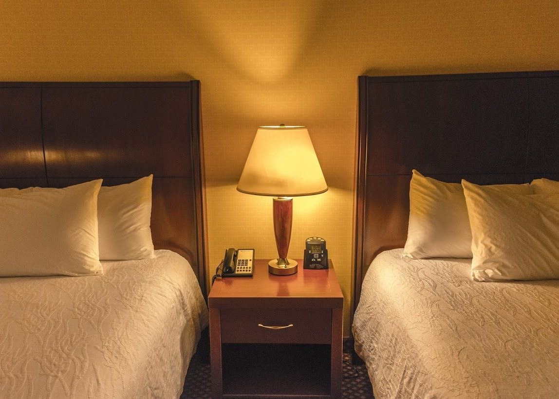 two queen beds evolution room | 1 bedroom, iron/ironing board, free cots/infant beds, free wifi