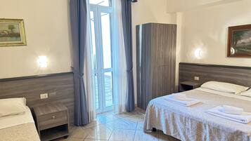 Memory-foam beds, minibar, desk, blackout curtains