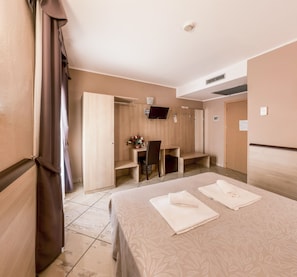 Double Room | Pillow-top beds, minibar, desk, blackout curtains