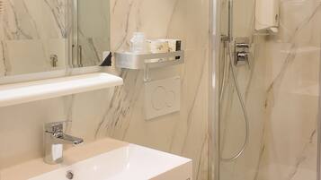 Shower, free toiletries, hair dryer, towels
