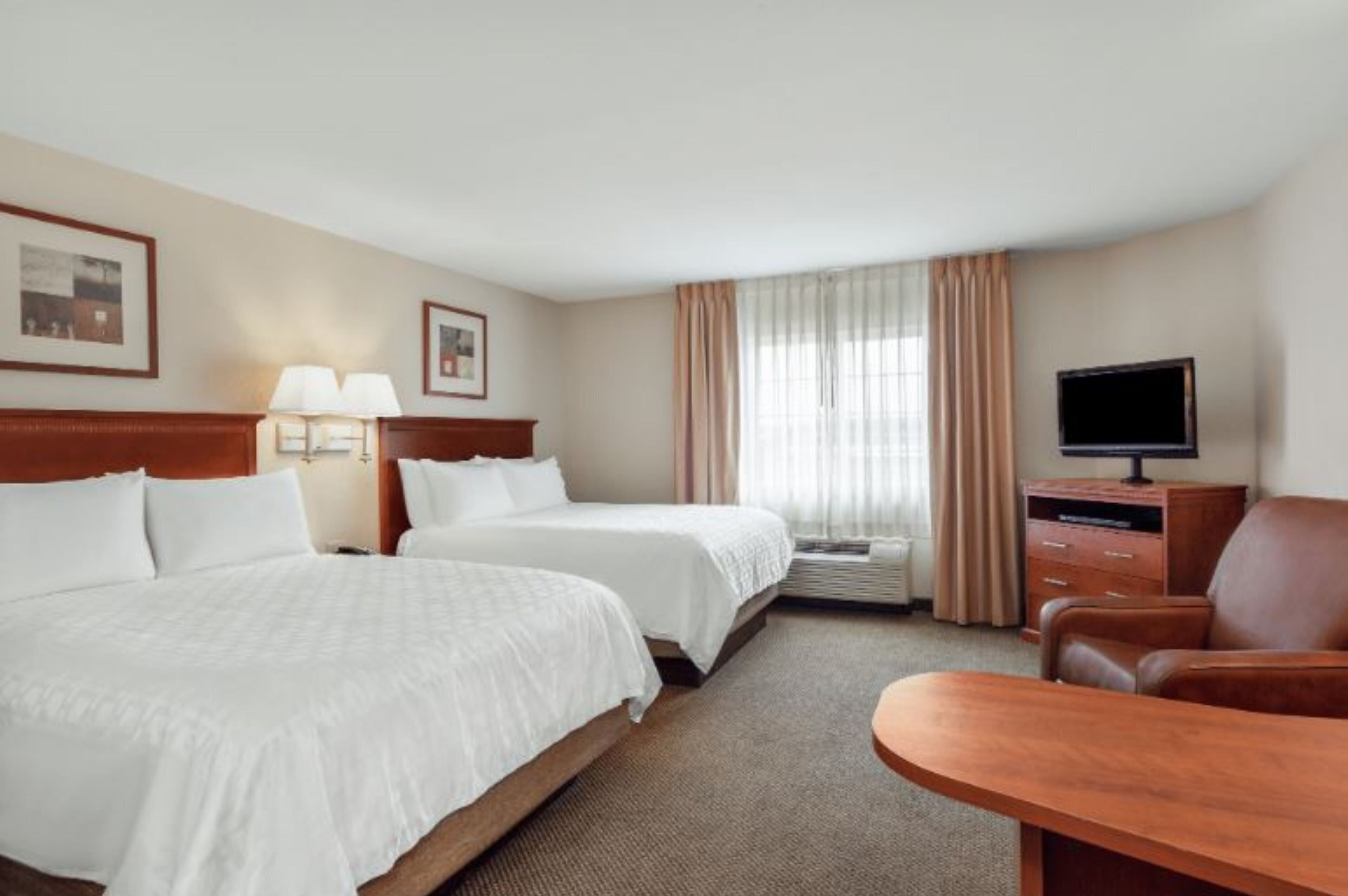 Premium bedding, down duvets, pillow-top beds, in-room safe