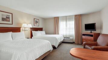 Premium bedding, down duvets, pillow-top beds, in-room safe