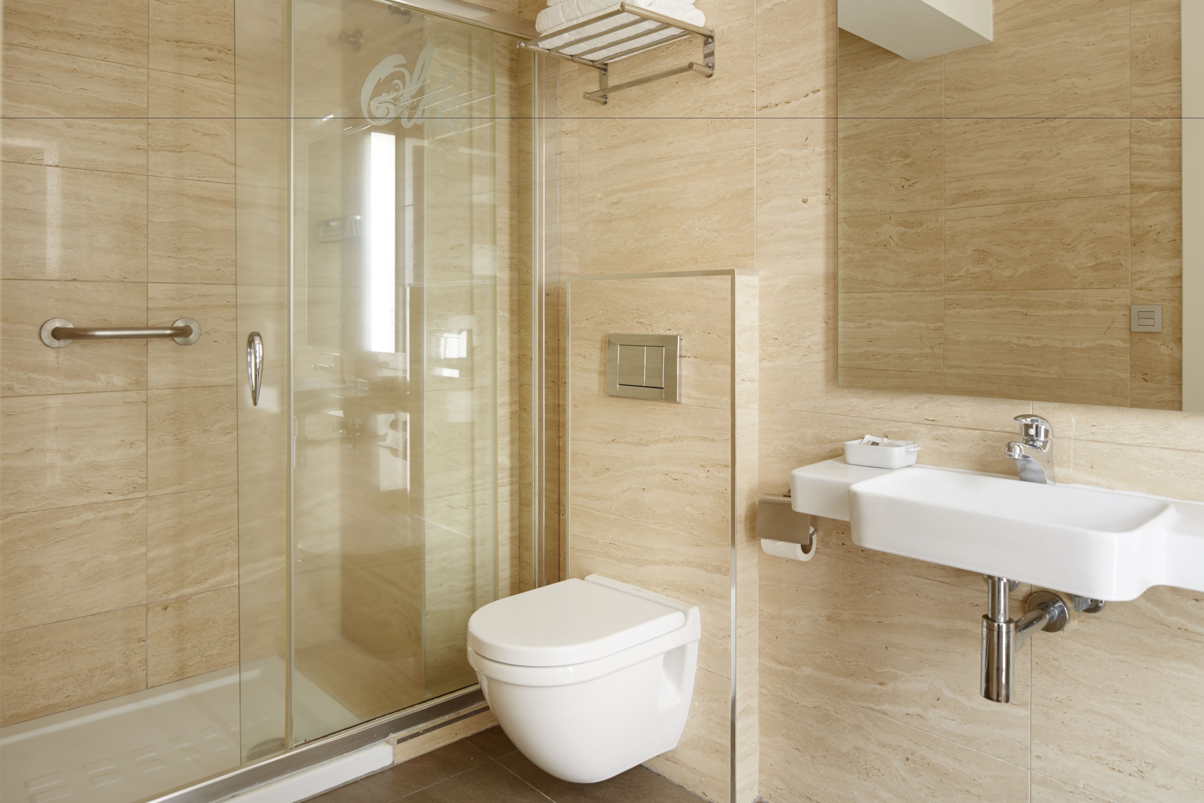 shower, free toiletries, hair dryer, towels