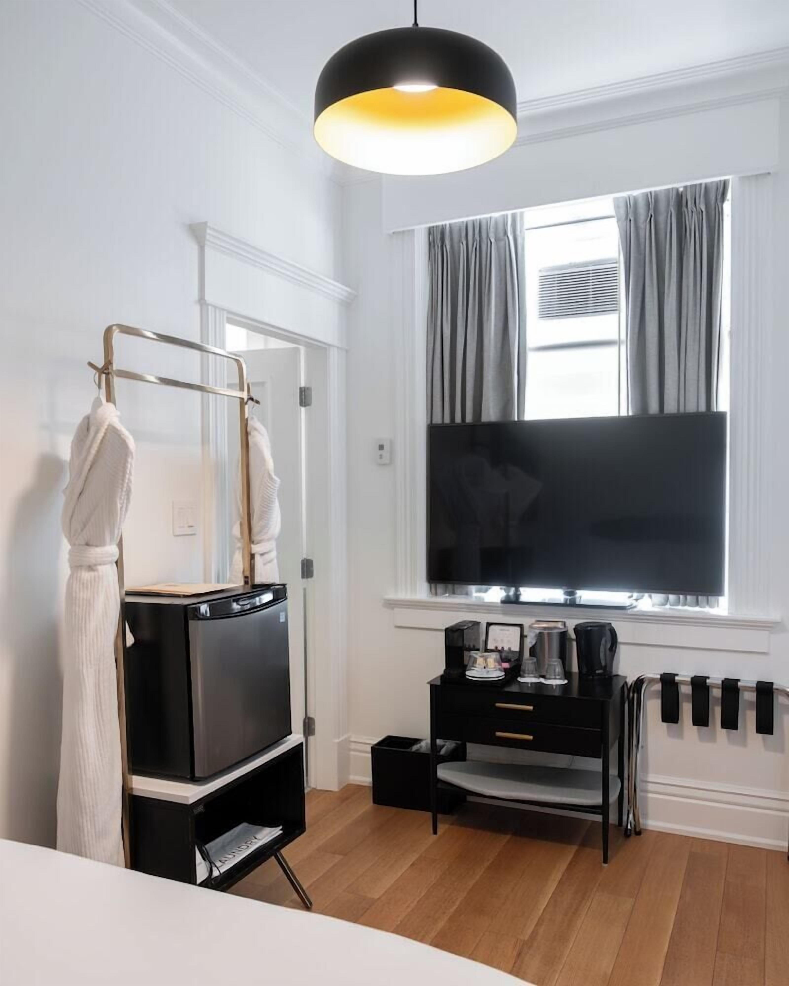 Premium bedding, down comforters, pillowtop beds, in-room safe