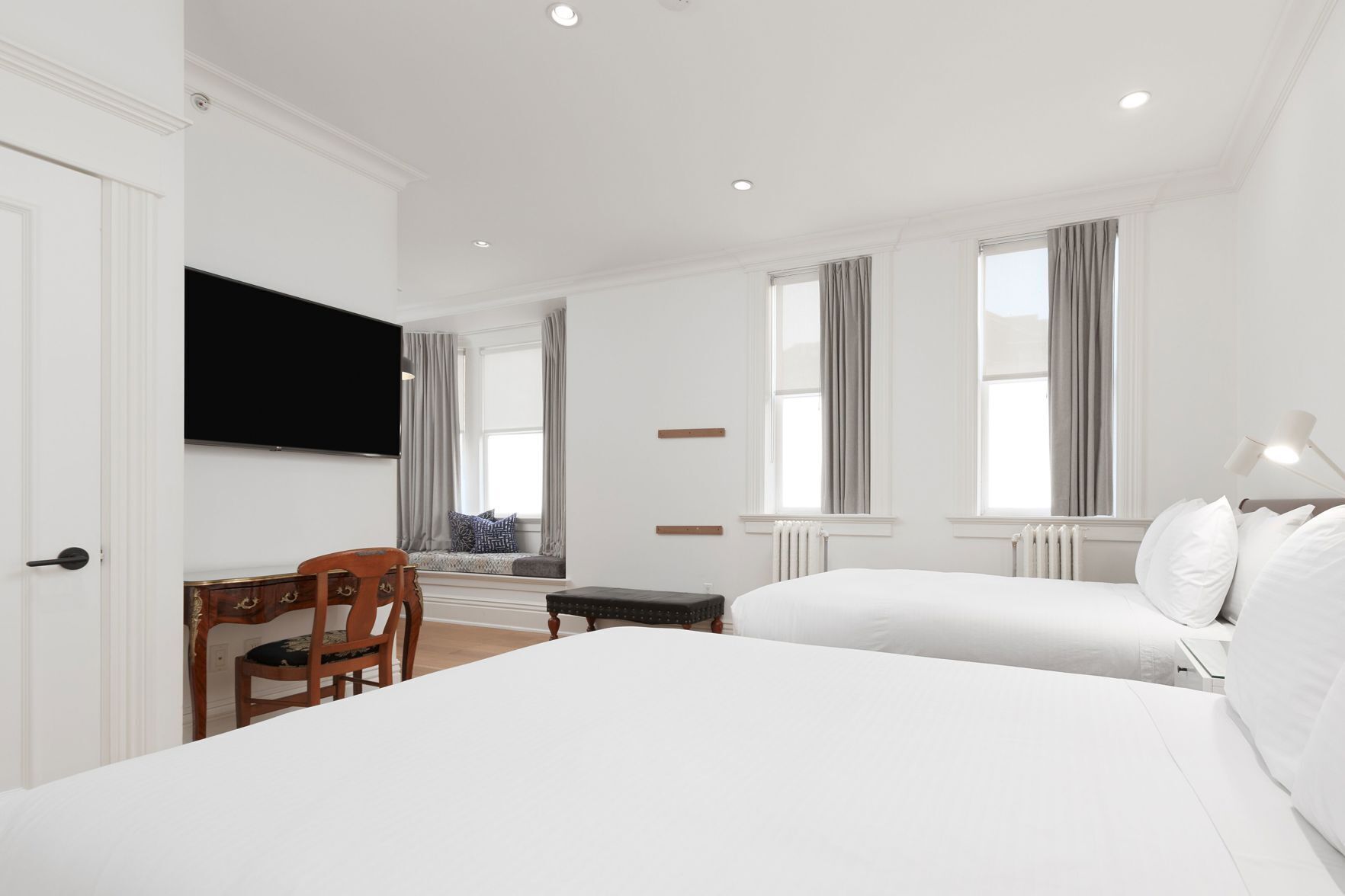 Premium bedding, down comforters, pillowtop beds, in-room safe