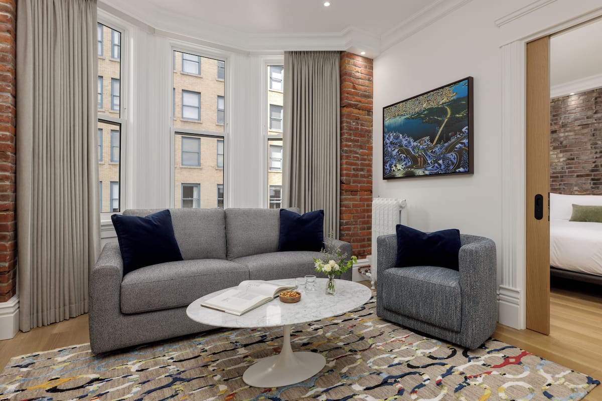 Rockwell King Suite | Living area | Flat-screen TV