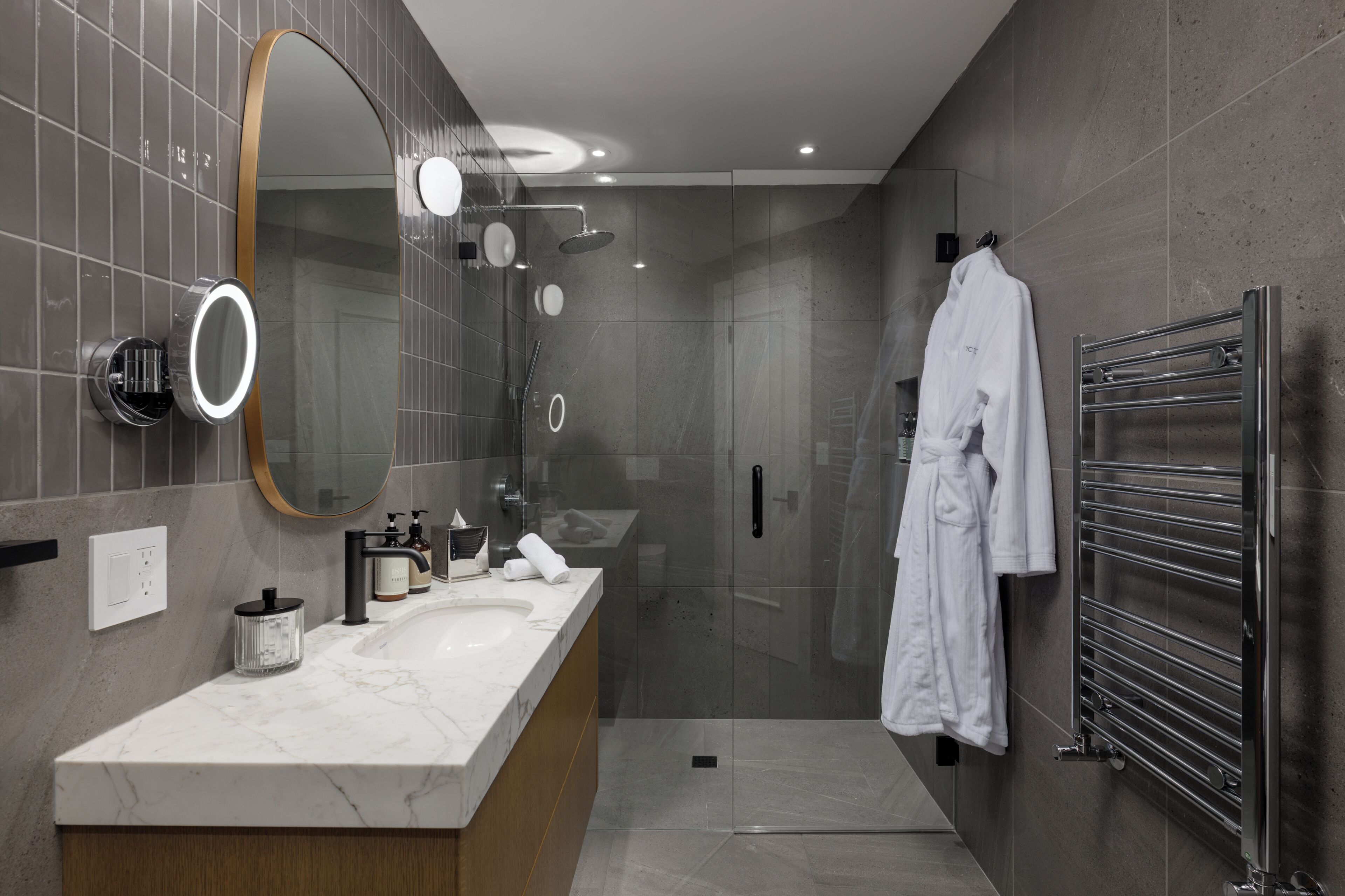 Rockwell King Suite | Bathroom | Eco-friendly toiletries, hair dryer, bathrobes, towels