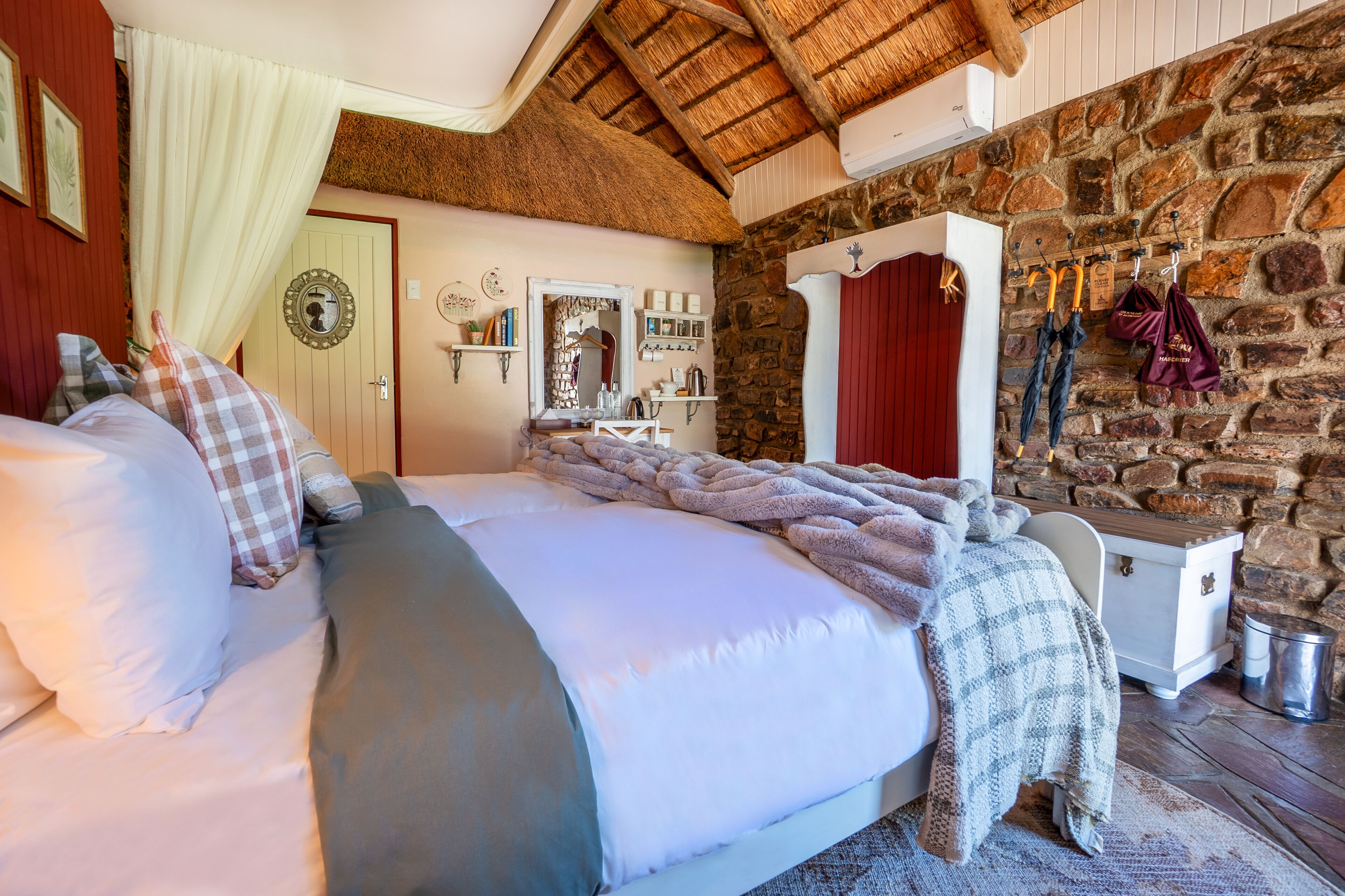 In-room safe, desk, laptop workspace, bed sheets