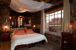 In-room safe, desk, laptop workspace, bed sheets