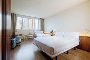 Triple Room | Minibar, in-room safe, desk, soundproofing