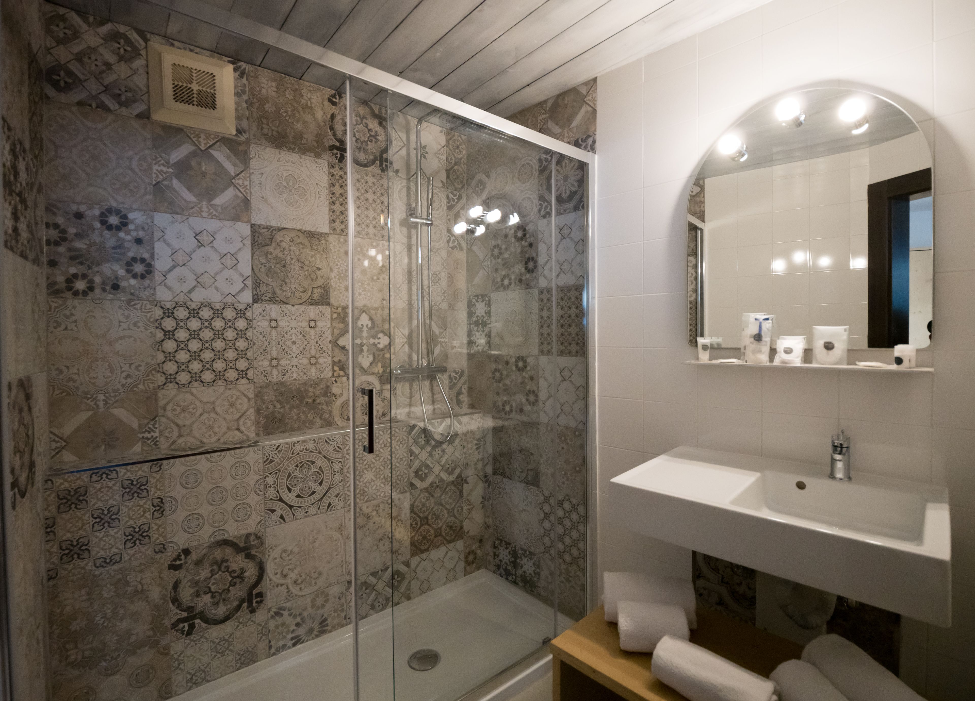 hair dryer, bathrobes, bidet, towels