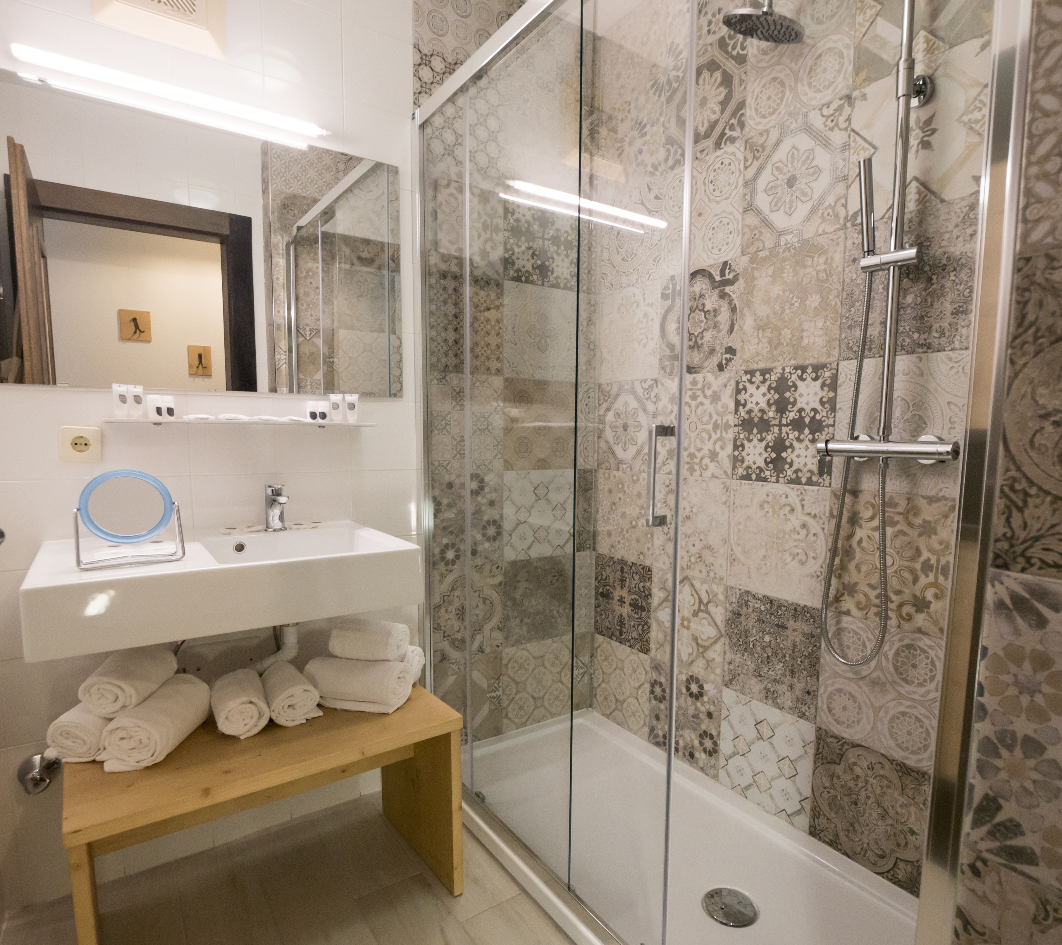 hair dryer, bathrobes, bidet, towels