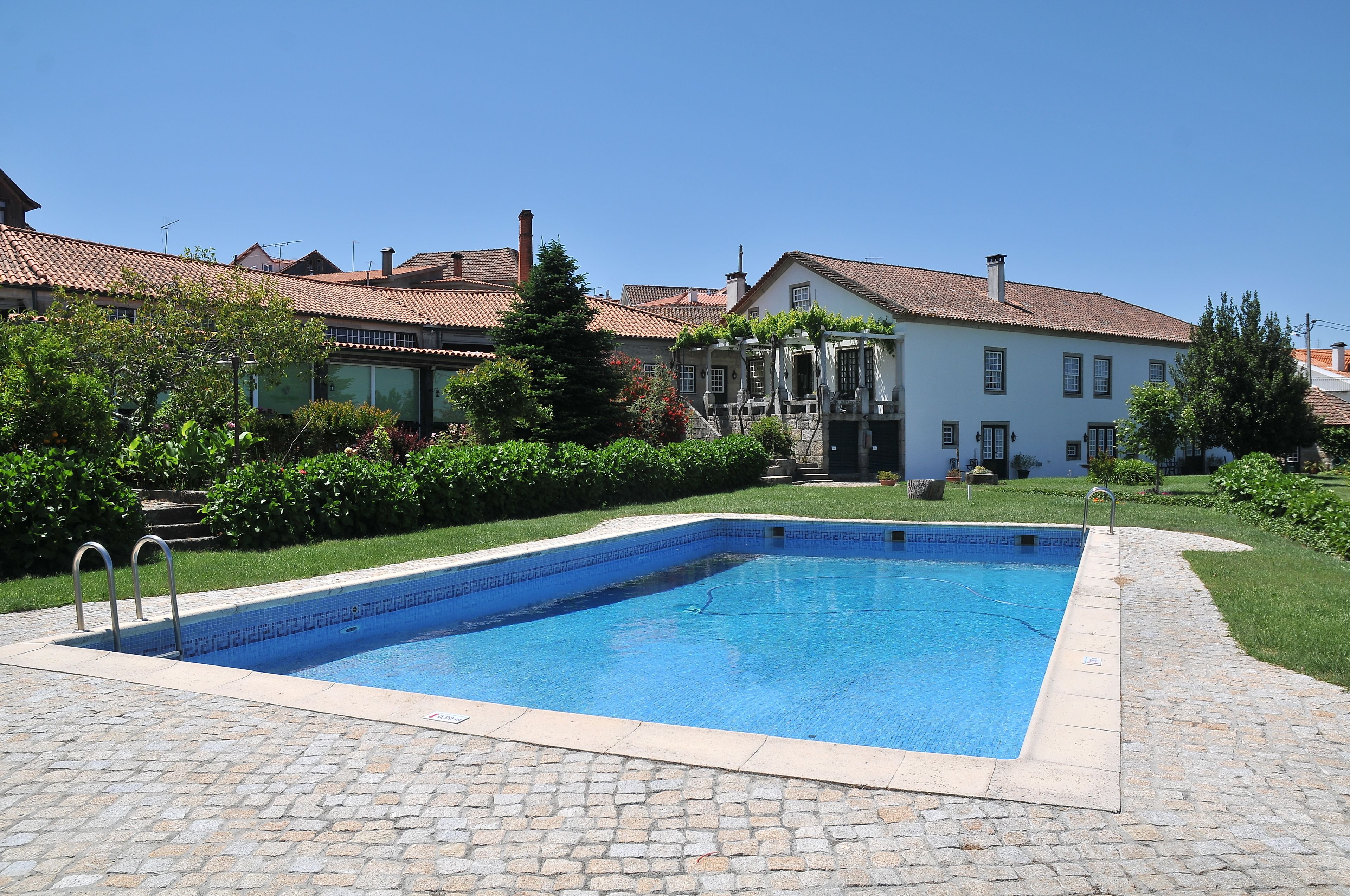 Outdoor pool, pool umbrellas, pool loungers