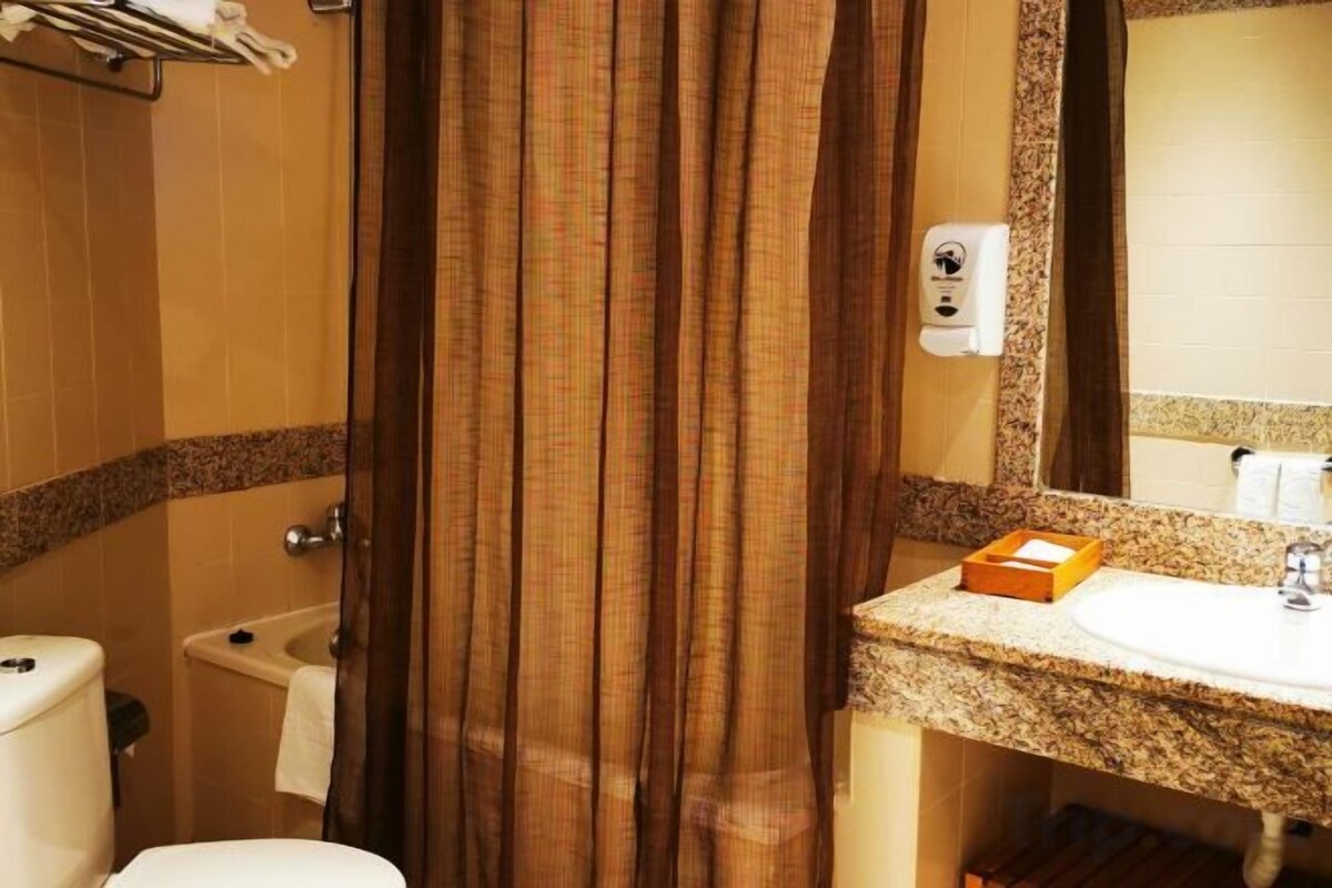 Bathroom | Bathtub, free toiletries, hair dryer, bidet