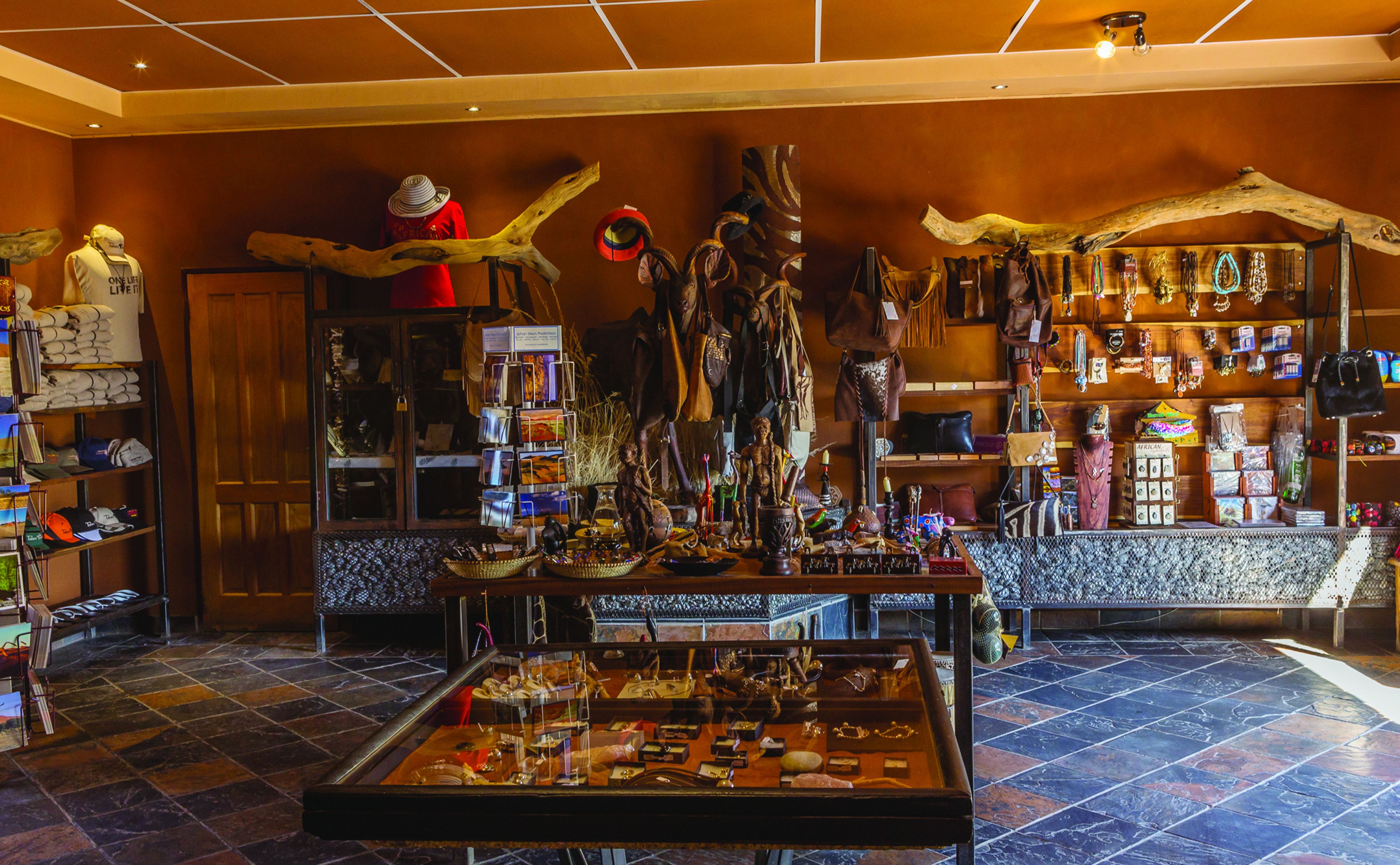 A jewelry store with various items on display, including necklaces, bracelets, and earrings.