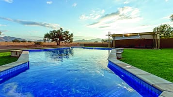 Outdoor pool, pool umbrellas, sun loungers