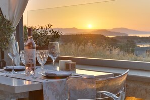 Breakfast, lunch, dinner served; Greek cuisine, pool views