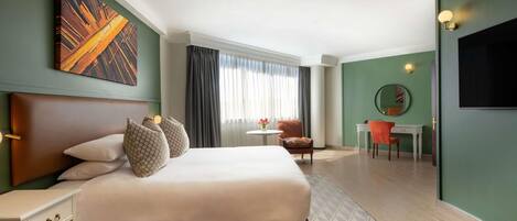 Suite, 1 Bedroom, Garden View | In-room safe, desk, blackout drapes, soundproofing