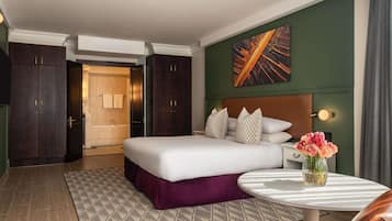 Suite, 1 Bedroom, Garden View | In-room safe, desk, blackout drapes, soundproofing