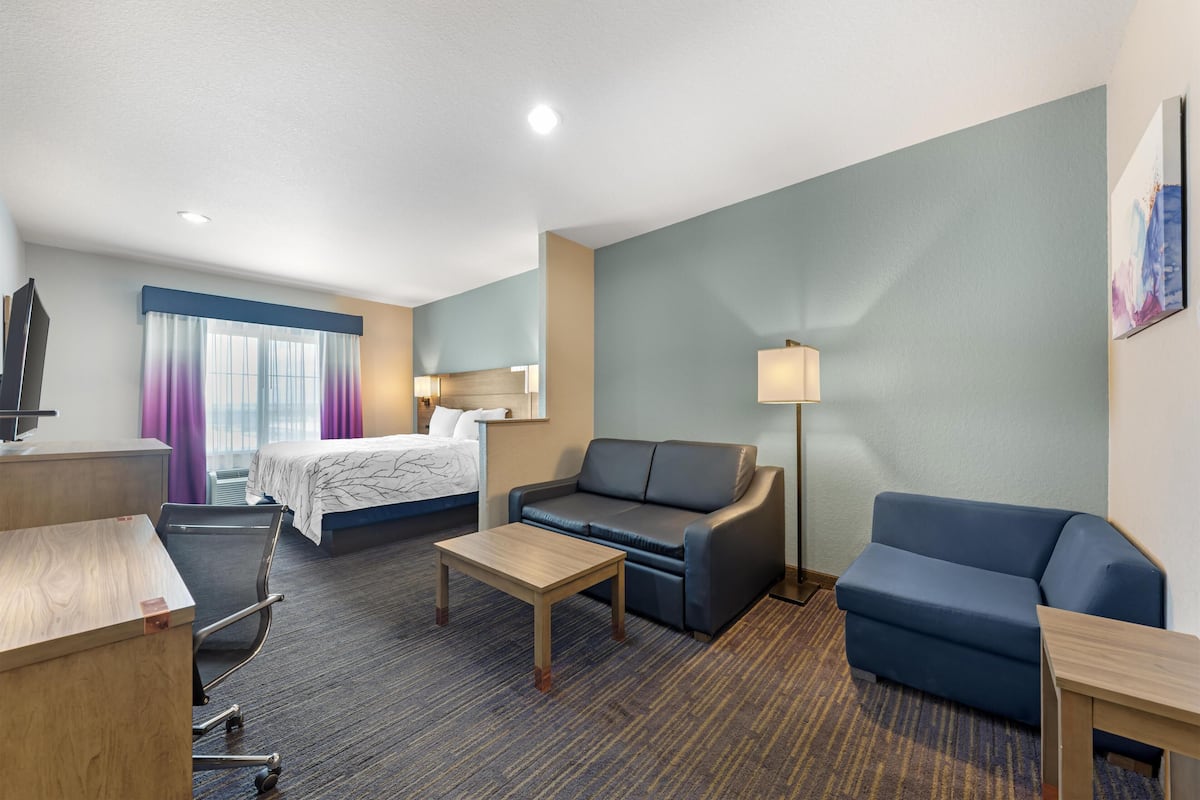 Desk, laptop workspace, blackout curtains, iron/ironing board