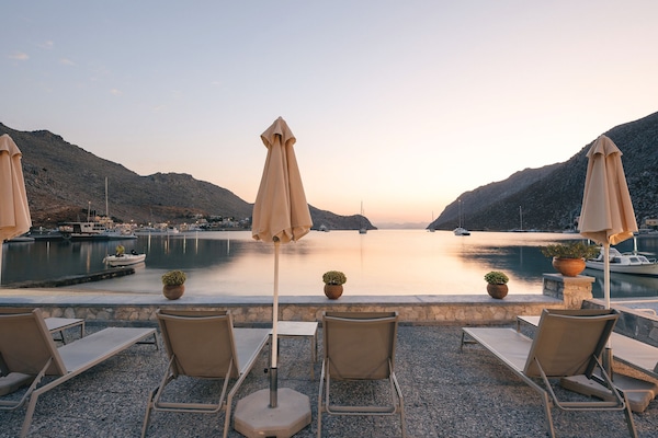 Di pantai, pasir putih, tuala pantai