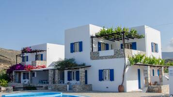 Seasonal outdoor pool, pool umbrellas, pool loungers