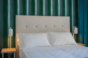 Couette en duvet d'oie, minibar, coffres-forts dans les chambres