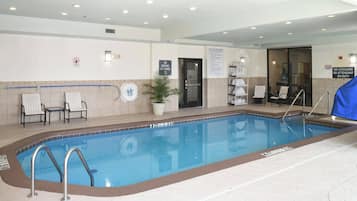 Indoor pool, open 6:00 AM to 10:00 PM, pool loungers