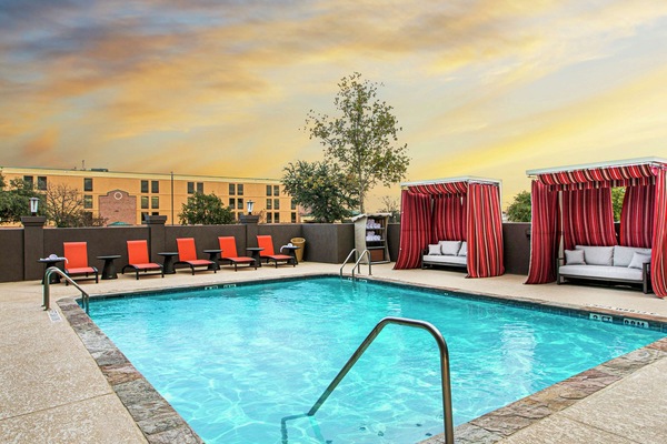 Outdoor pool, open 6:00 AM to 10:00 PM, free cabanas, sun loungers