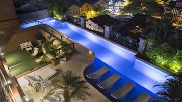 Seasonal outdoor pool, open 6 AM to 10 PM, sun loungers