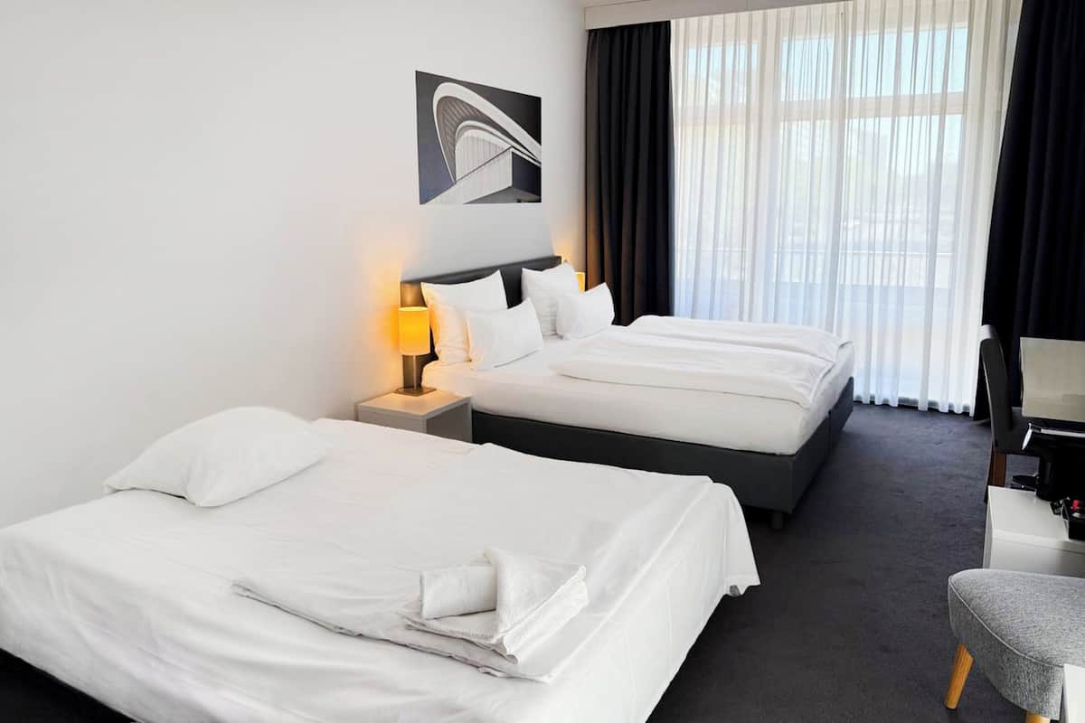 Premium Room, Multiple Beds (Up to 3 Adults) | Hypo-allergenic bedding, in-room safe, desk, blackout curtains