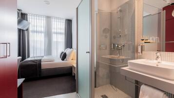 Shower, free toiletries, hair dryer, towels