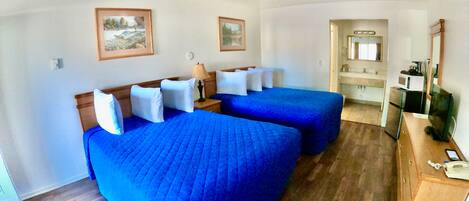 Premium bedding, blackout drapes, free WiFi, bed sheets