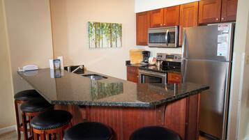 Room, 1 Bedroom (1st Floor C) | Private kitchen | Full-size fridge, microwave, oven, stovetop