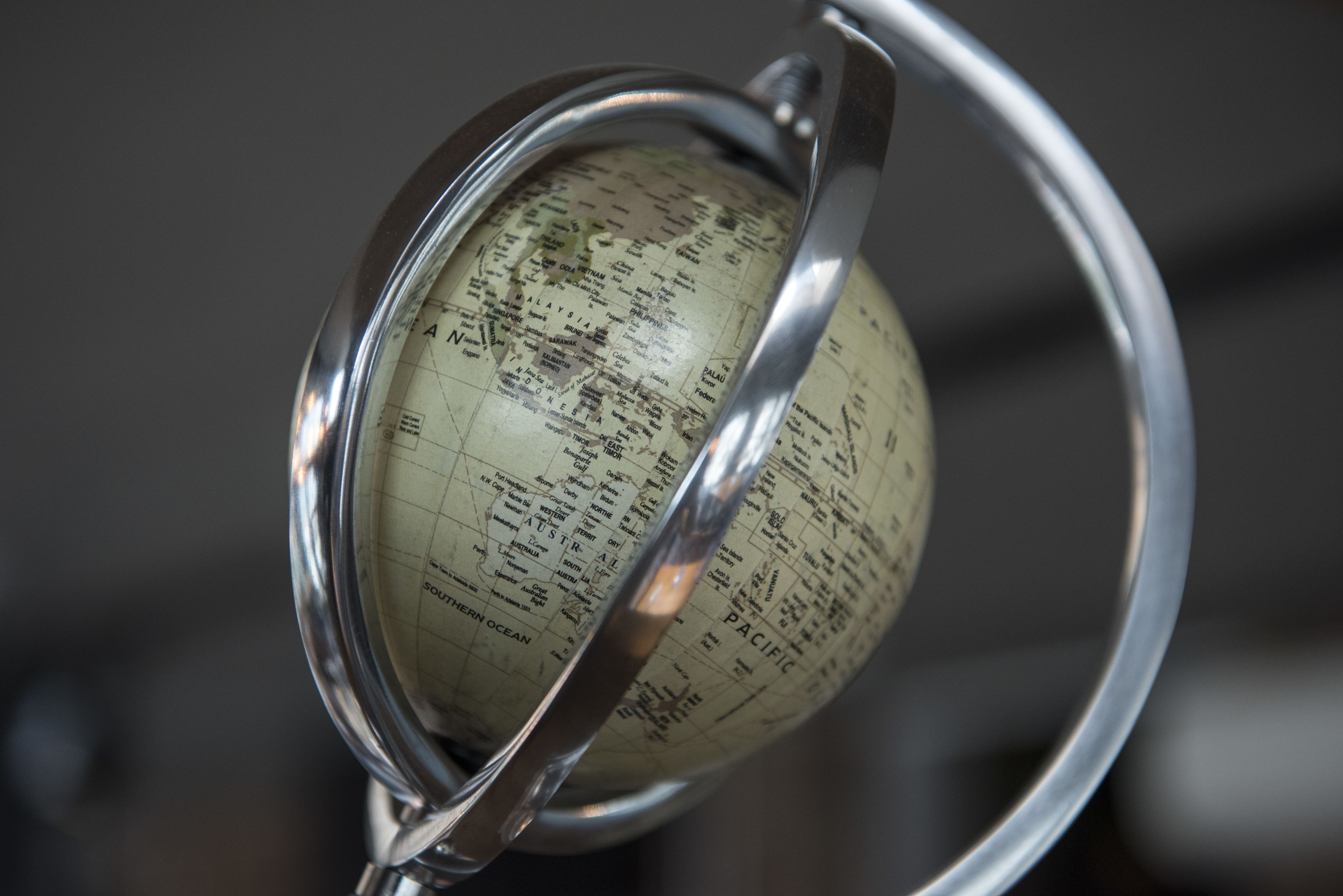 A globe with a metal stand.