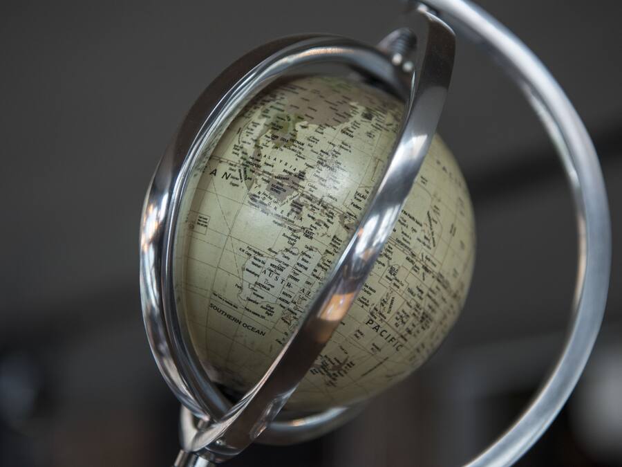 A globe with a metal stand.