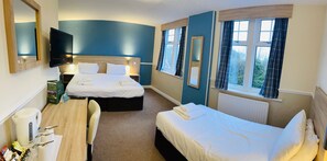 Family Room | Desk, free WiFi, bed sheets