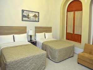 Deluxe Room, 2 Double Beds | In-room safe, desk, iron/ironing board, free WiFi - Casa De Los Dulces Suenos (Morelia)