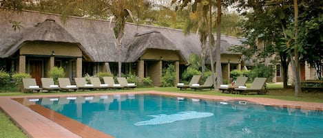 2 outdoor pools, pool umbrellas, pool loungers