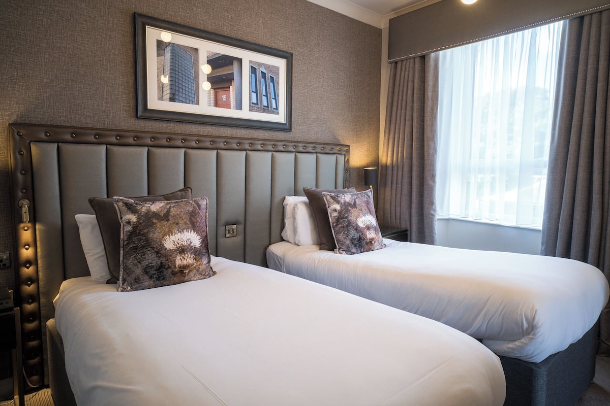 Kamar Twin Deluks | Meja kerja, setrika/meja setrika, Wi-Fi gratis, dan seprai linen