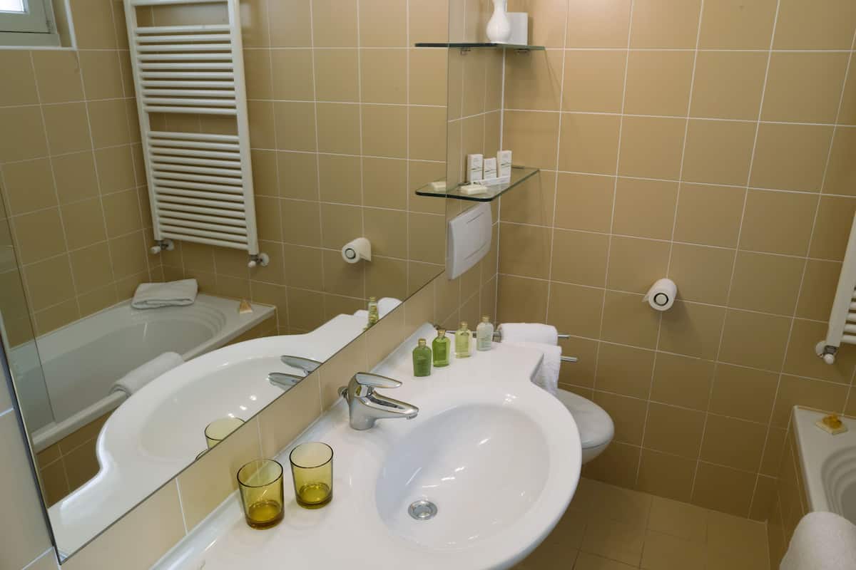 hair dryer, bidet, towels