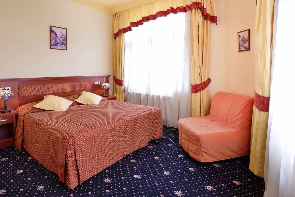 Camera Standard con letto matrimoniale o 2 letti singoli | Biancheria da letto ipoallergenica, minibar, una cassaforte in camera