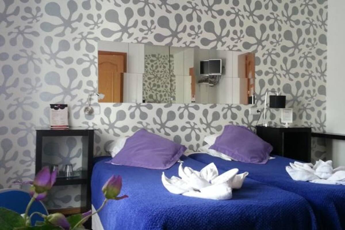 Twin Room | Iron/ironing board, rollaway beds, free WiFi